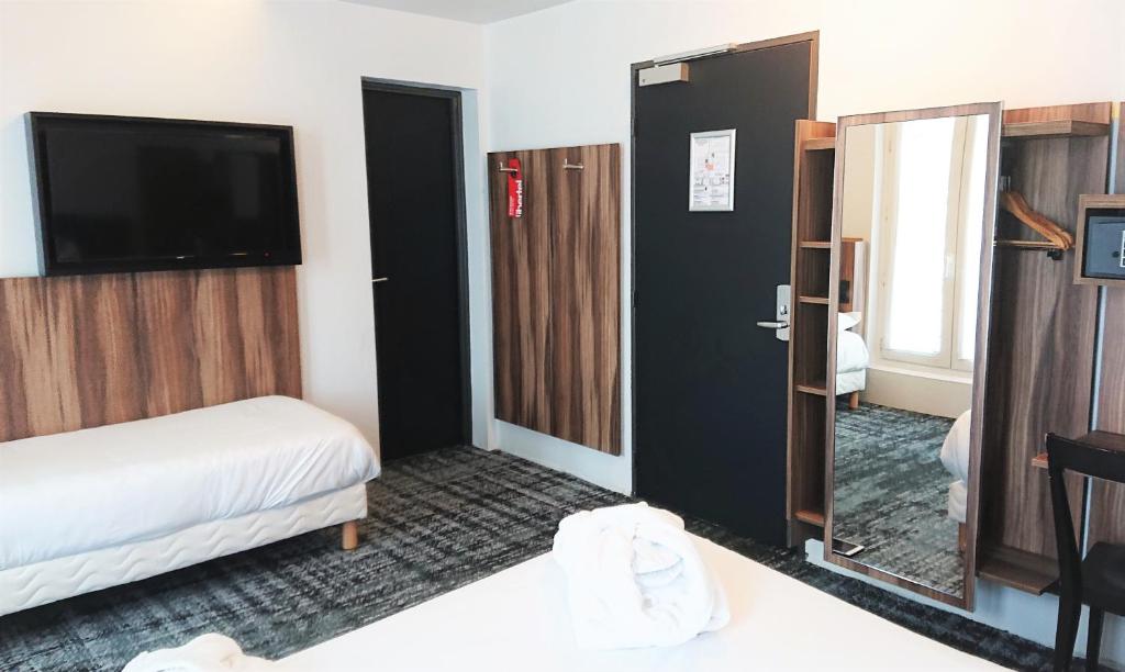 Chambre triple Libertel Austerlitz Jardin des Plantes - Booking