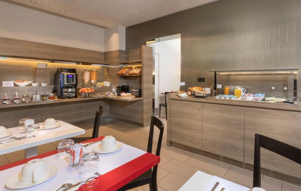 Salle Petit-déjeuner Libertel Austerlitz Jardin des Plantes - Booking