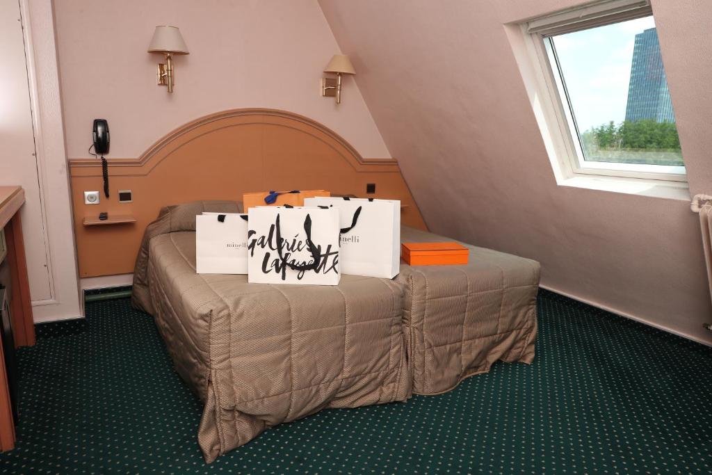 Chambre double Hôtel des Arènes - Booking