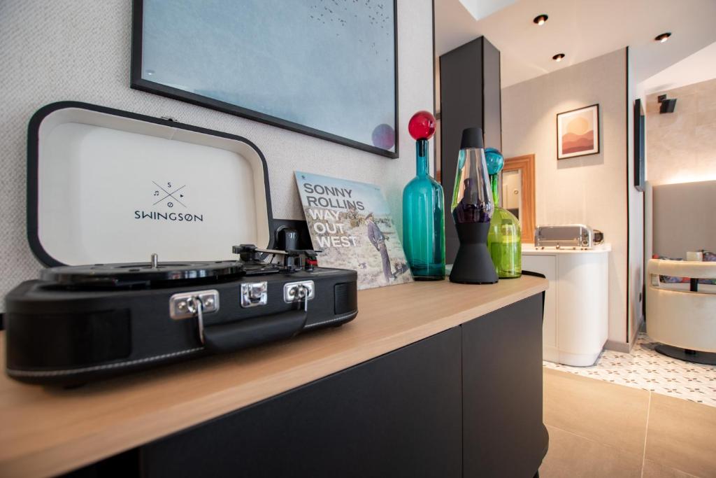 Détail chambre Hôtel de l’Espérance - Booking