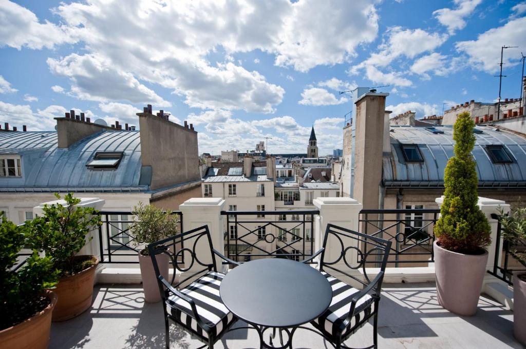 Terrasse privative L'Hôtel - Booking