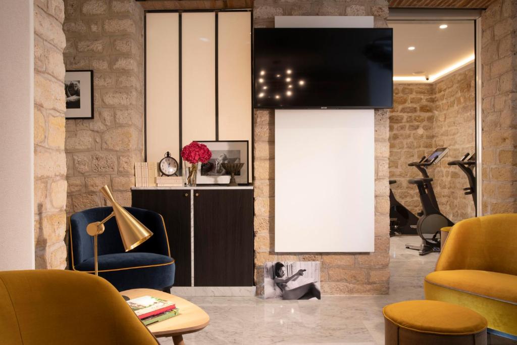 Hôtel des Arts Montmartre - salle de fitness - Booking