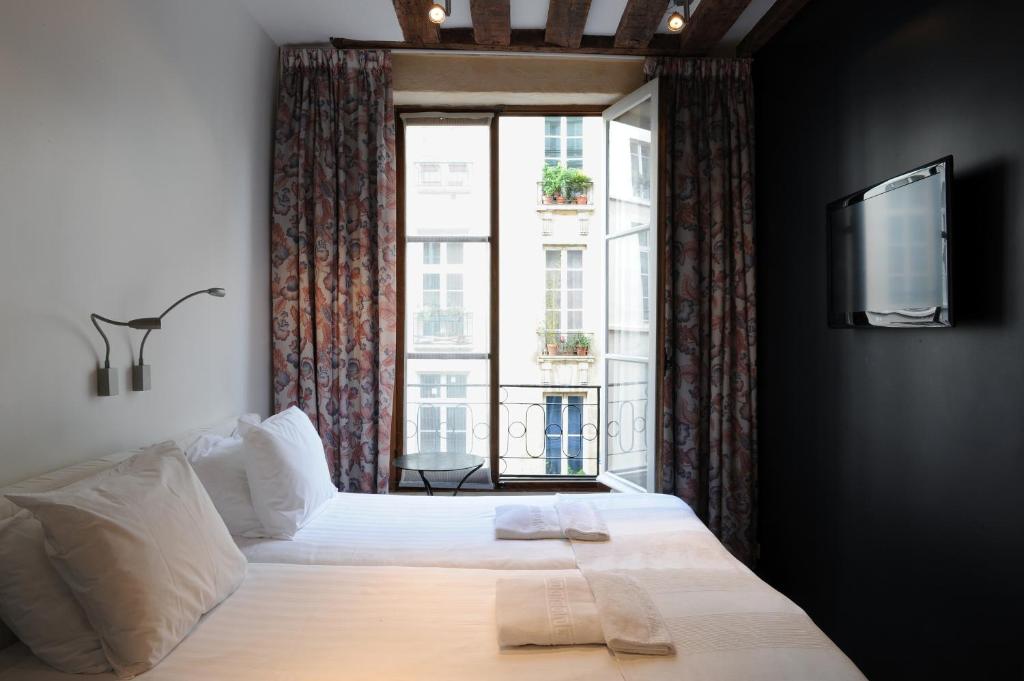Boutique Hôtel de la Place des Vosges - Booking