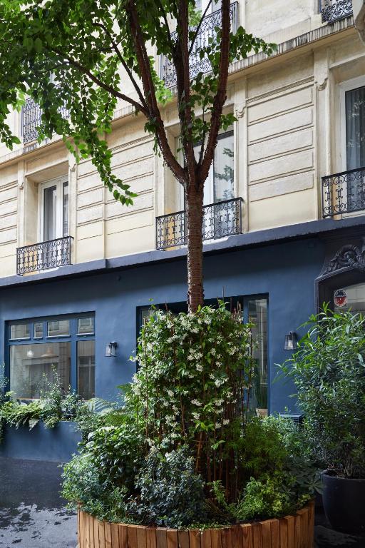 Façade entrée Hôtel Taylor - Booking