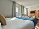 Hotel Atrium by Happyculture